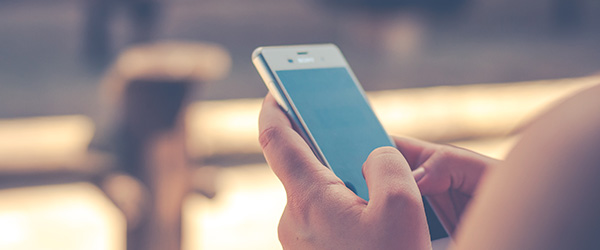 Woman holding iPhone